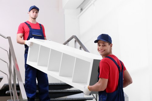 Office and business relocation items ready for transport in Acton