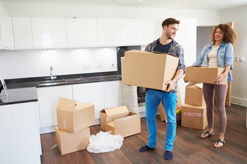 Packing and loading household items for an Acton home move