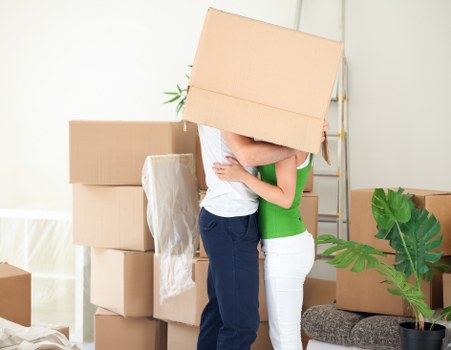 Careful loading of furniture for an urgent move in Acton