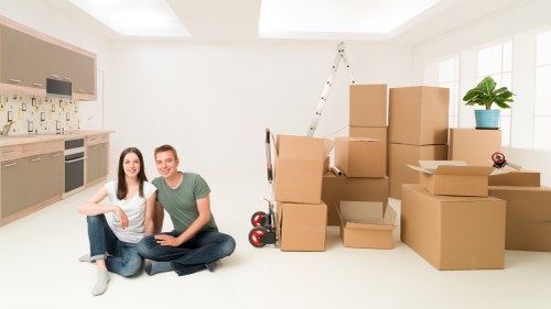 Packed boxes and dismantled furniture ready for a West London flat move