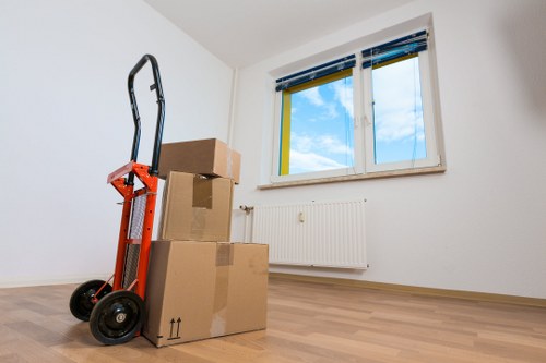 Local team handling bulky furniture removal on an Acton street